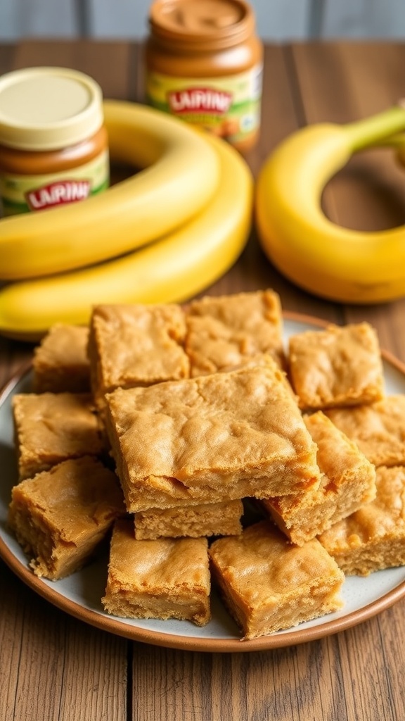Peanut butter banana bars cut into squares on a plate, with bananas and peanut butter in the background.